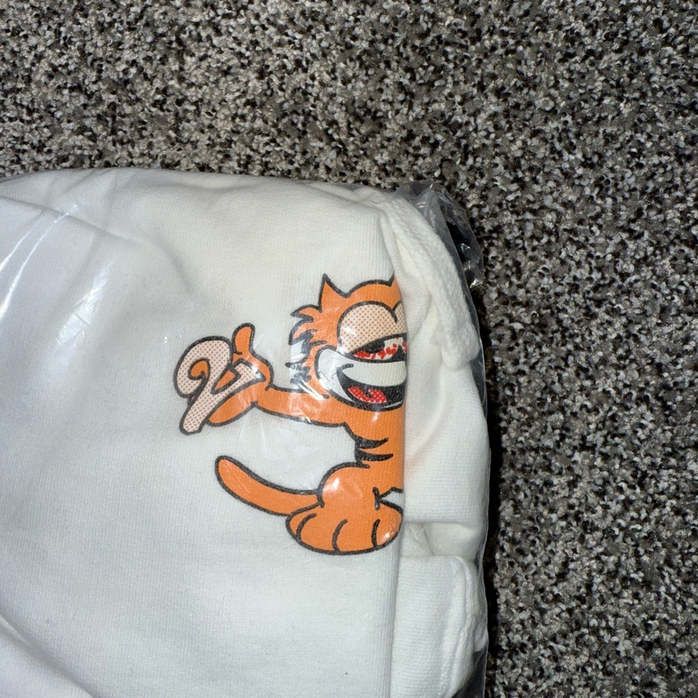 White Hoodie with Cartoon Cat Graphic